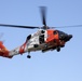 Alaska based Coast Guard aviators showcase rescue demonstration during multi-agency hoist symposium