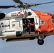 Alaska based Coast Guard aviators showcase rescue demonstration during multi-agency hoist symposium