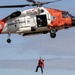 Alaska based Coast Guard aviators showcase rescue demonstration during multi-agency hoist symposium