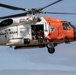 Alaska based Coast Guard aviators showcase rescue demonstration during multi-agency hoist symposium