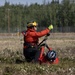 Alaska based Coast Guard aviators showcase rescue demonstration during multi-agency hoist symposium