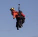 Alaska based Coast Guard aviators showcase rescue demonstration during multi-agency hoist symposium