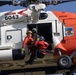 Alaska based Coast Guard aviators showcase rescue demonstration during multi-agency hoist symposium