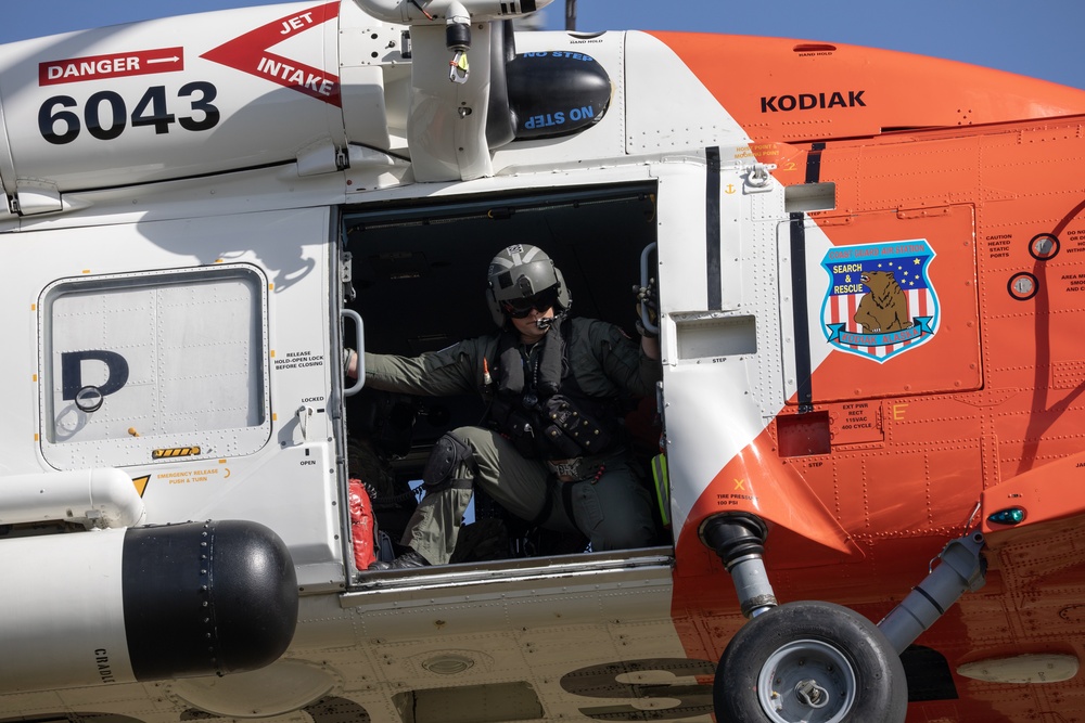 Alaska based Coast Guard aviators showcase rescue demonstration during multi-agency hoist symposium