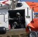 Alaska based Coast Guard aviators showcase rescue demonstration during multi-agency hoist symposium