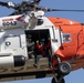 Alaska based Coast Guard aviators showcase rescue demonstration during multi-agency hoist symposium