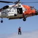 Alaska based Coast Guard aviators showcase rescue demonstration during multi-agency hoist symposium