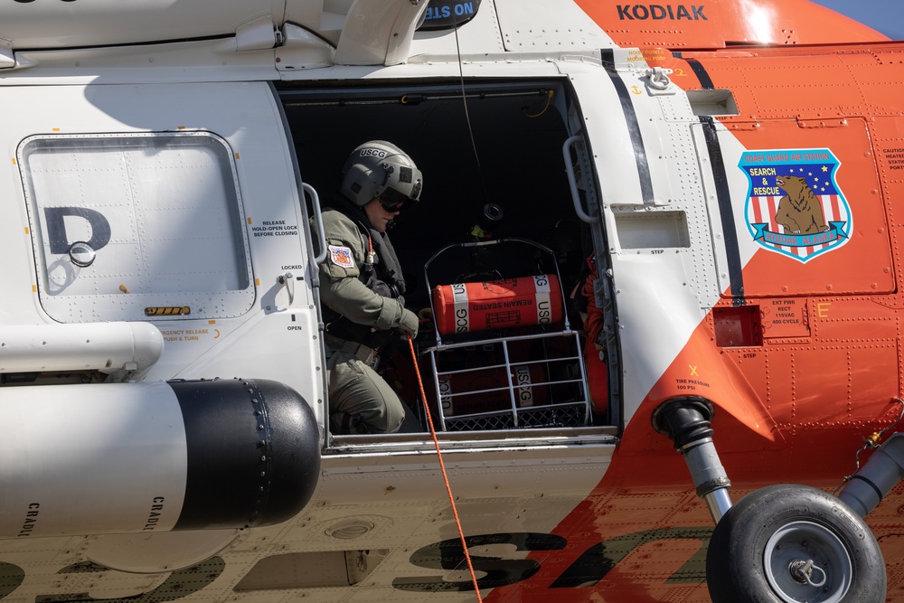 Alaska based Coast Guard aviators showcase rescue demonstration during multi-agency hoist symposium