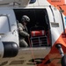 Alaska based Coast Guard aviators showcase rescue demonstration during multi-agency hoist symposium