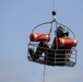 Alaska based Coast Guard aviators showcase rescue demonstration during multi-agency hoist symposium