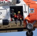 Alaska based Coast Guard aviators showcase rescue demonstration during multi-agency hoist symposium