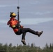 Alaska based Coast Guard aviators showcase rescue demonstration during multi-agency hoist symposium