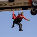 Alaska based Coast Guard aviators showcase rescue demonstration during multi-agency hoist symposium