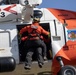 Alaska based Coast Guard aviators showcase rescue demonstration during multi-agency hoist symposium