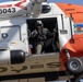 Alaska based Coast Guard aviators showcase rescue demonstration during multi-agency hoist symposium