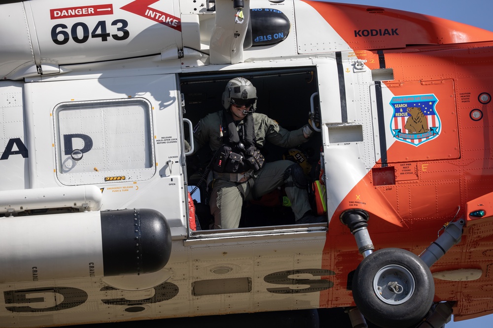 Alaska based Coast Guard aviators showcase rescue demonstration during multi-agency hoist symposium