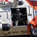 Alaska based Coast Guard aviators showcase rescue demonstration during multi-agency hoist symposium