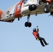 Alaska based Coast Guard aviators showcase rescue demonstration during multi-agency hoist symposium