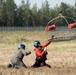 Alaska based Coast Guard aviators showcase rescue demonstration during multi-agency hoist symposium