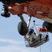 Alaska based Coast Guard aviators showcase rescue demonstration during multi-agency hoist symposium
