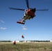 Alaska based Coast Guard aviators showcase rescue demonstration during multi-agency hoist symposium