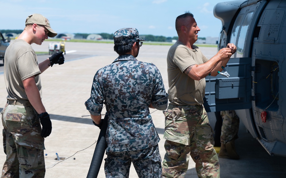 Japan Air Self-Defense Force Refuels 106th Rescue Wing HH-60Ws During REFORPAC 2025
