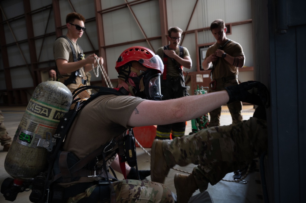 Airmen Train for Emergencies in Simulated Confined-Space Scenario