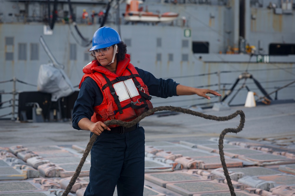 OSSA Tayler Hemphill flakes an aft deck line on the missile deck