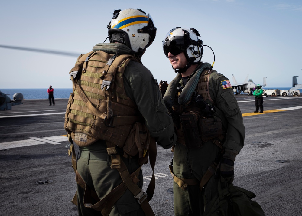 Commander, Carrier Strike Group 12 Disembarks an MH-60R Sea Hawk