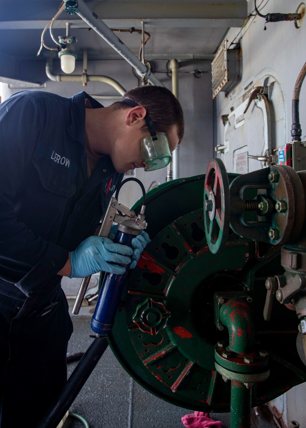 USS Gerald R. Ford (CVN 78) Sailor Conducts Maintenance