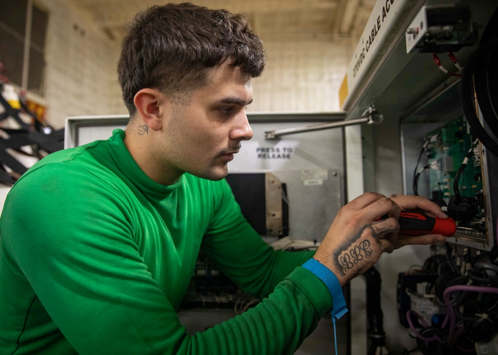 USS Gerald R. Ford (CVN 78) Sailor Conducts Maintenance