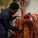 USS Gerald R. Ford (CVN 78) Sailor Restows Fire Hose