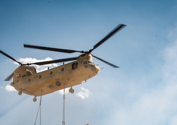 Washington National Guard Chinook helicopters bring out the big guns during Raven Focus 2025