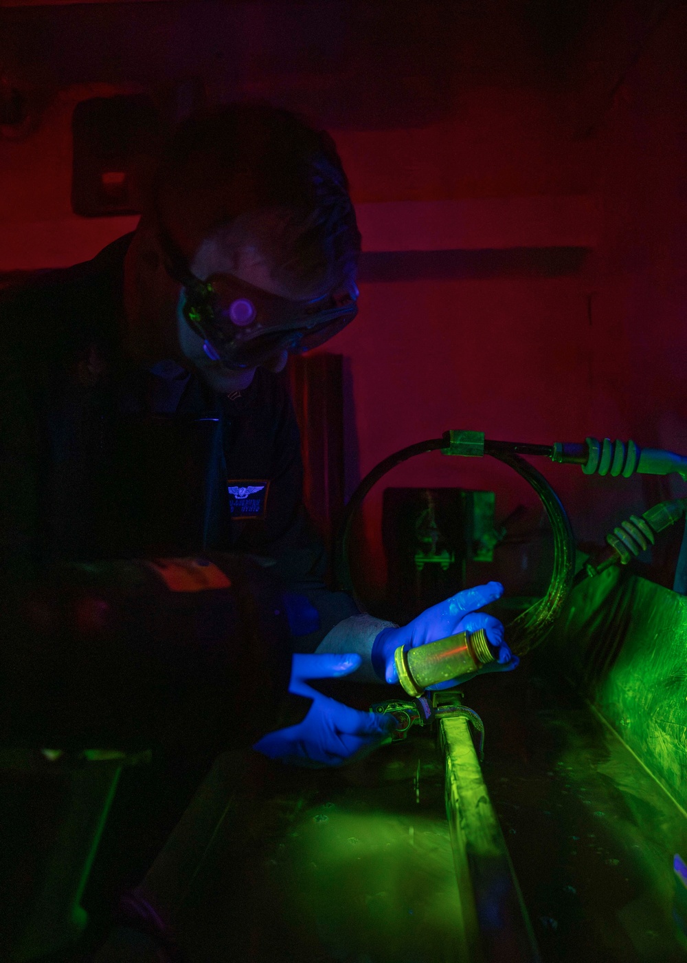 USS Gerald R. Ford (CVN 78) Sailor Conducts A Magnetic Particle Inspection