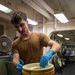 USS Gerald R. Ford (CVN 78) Sailor Lubricates Tire Rims