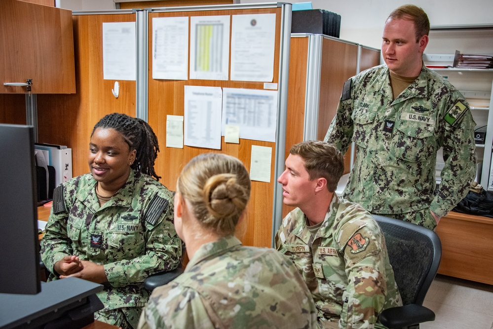 Air Guardsmen integrate with Navy for readiness training in Italy