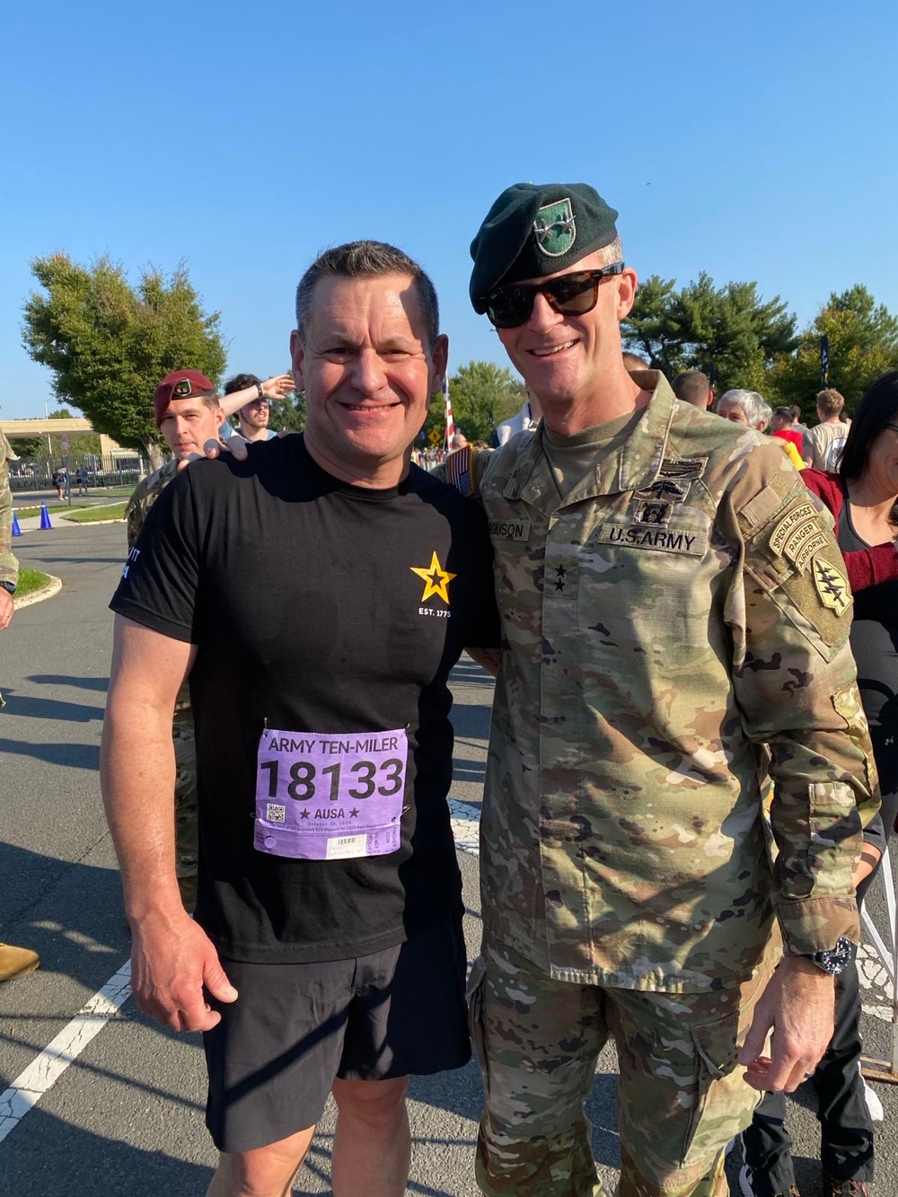 Maj. Gen. Ferguson and Sgt. Maj. of the Army Weimer meet at the finish line of the 2024 Army Ten Miler Maj. Gen. Ferguson and Sgt. Maj. of the Army Weimer meet at the finish line of the 2024 Army Ten Miler