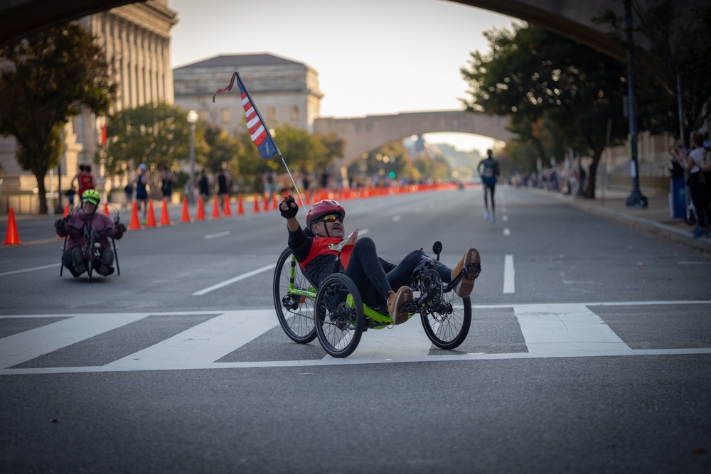 Para-Athlete Waves to Raucous Crowd at the 41st Annual Army Ten Miler Para-Athlete Waves to Raucous Crowd at the 41st Annual Army Ten Miler