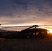 Washington National Guard Black Hawk helicopters at sunset