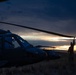 Washington National Guard Black Hawk helicopters at sunset