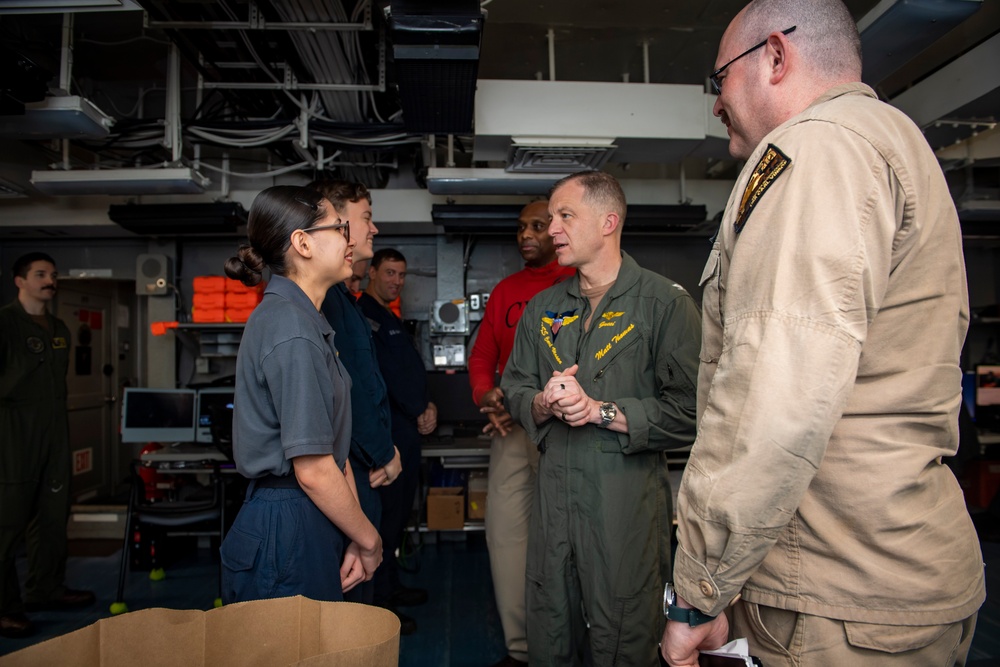 USS Carl Vinson (CVN 70) Commanding Officer Conducts Coining Ceremony