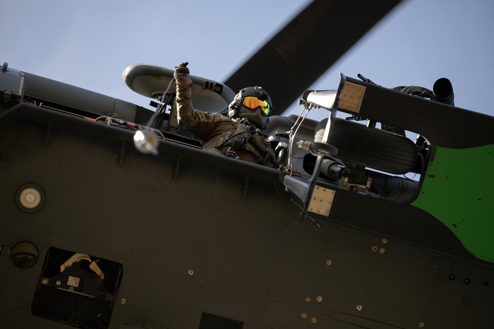 Alaska Air National Guardsmen showcase rescue demonstration during multi-agency hoist symposium