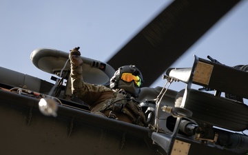 Alaska Air National Guardsmen showcase rescue demonstration during multi-agency hoist symposium