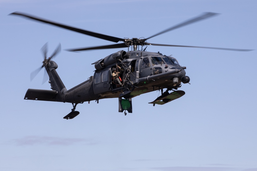 Alaska Air National Guardsmen showcase rescue demonstration during multi-agency hoist symposium