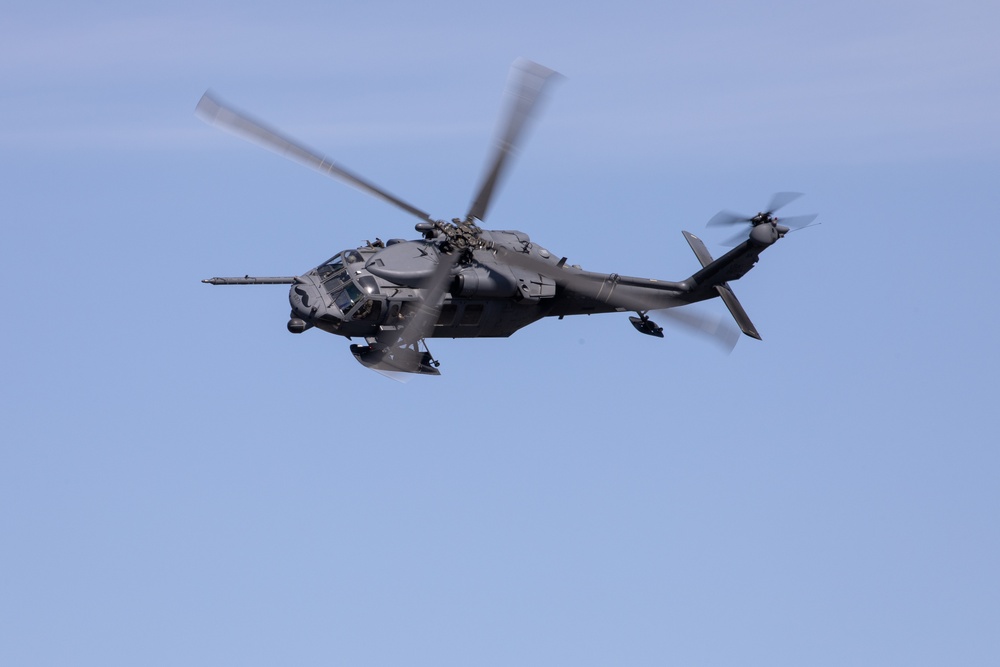 Alaska Air National Guardsmen showcase rescue demonstration during multi-agency hoist symposium