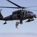 Alaska Air National Guardsmen showcase rescue demonstration during multi-agency hoist symposium