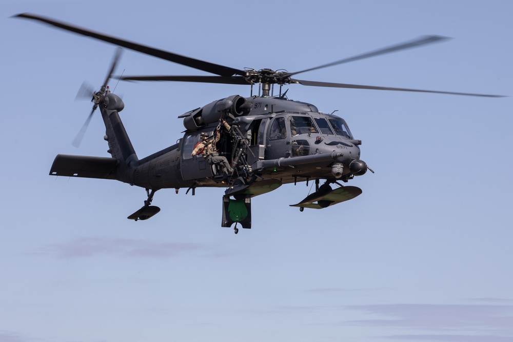 Alaska Air National Guardsmen showcase rescue demonstration during multi-agency hoist symposium