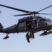 Alaska Air National Guardsmen showcase rescue demonstration during multi-agency hoist symposium