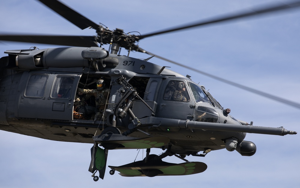 Alaska Air National Guardsmen showcase rescue demonstration during multi-agency hoist symposium