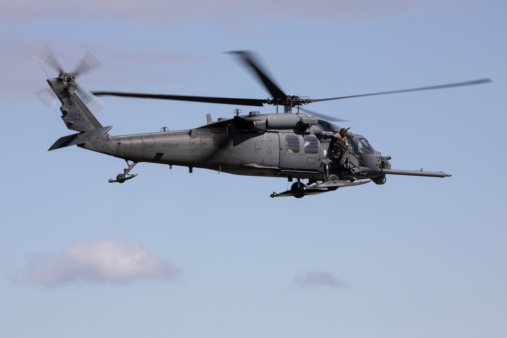 Alaska Air National Guardsmen showcase rescue demonstration during multi-agency hoist symposium